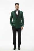 Green blazer jet black trousers — front