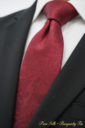 Close-up of burgundy red silk jacquard tie