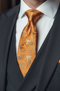 Model wearing Orange Paisley Tie with matching pocket square and cufflinks