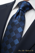 Close-up of navy blue checkered silk tie
