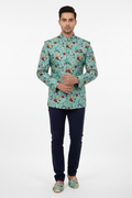 Front view - Bandhgala Prince Suit in mint floral embroidery fabric with navy trousers and matching jooti