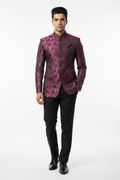 Front view studio - Bandhgala in pink feather print fabric with black trousers and formal shoes